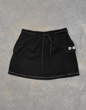 MINIFALDA CON SHORT Y COSTURAS CON CONTRASTES