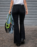 JEANS ACAMPANADOS CON BOLSAS DELANTERAS